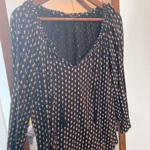 Black and white top with tassels